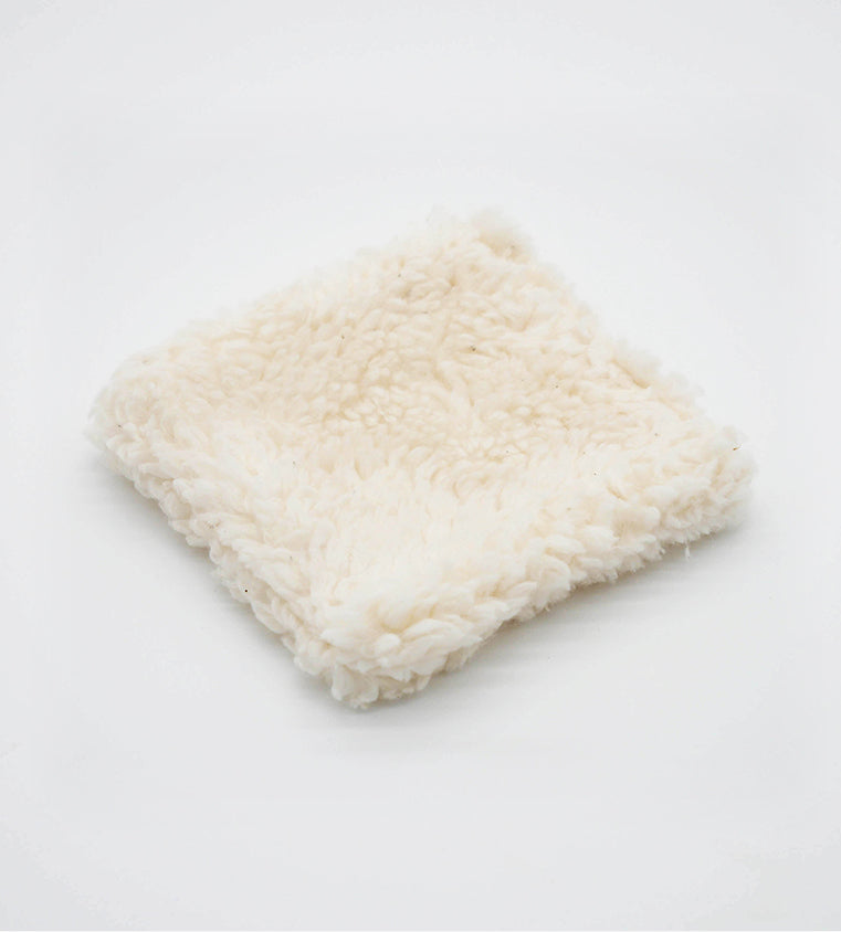 Plush and generously sized square pad made from 100% organic, dye-free sherpa cotton. Handmade and gentle for full-face cleansing.